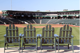 multiple seats back view at baseball field 