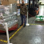 employee smiling in warehouse