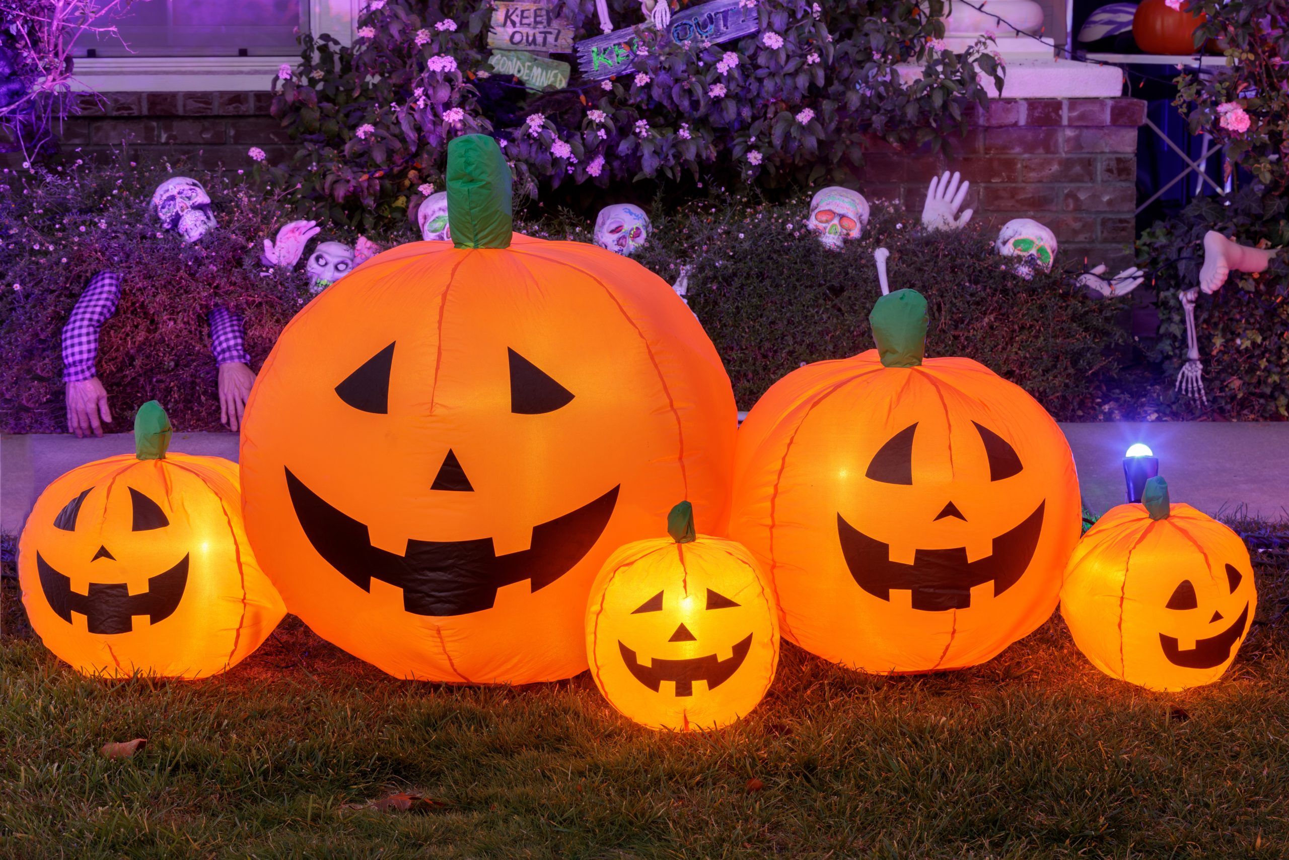 Inflatable pumpkins glowing. Halloween background decoration out