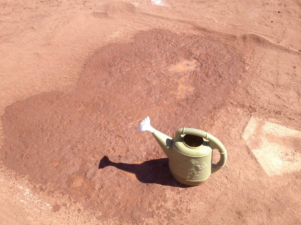 watering can on field 