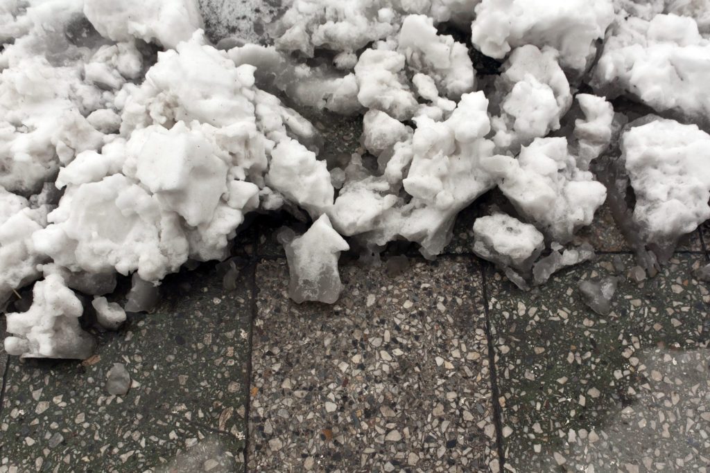 close-up of ice on sidewalk